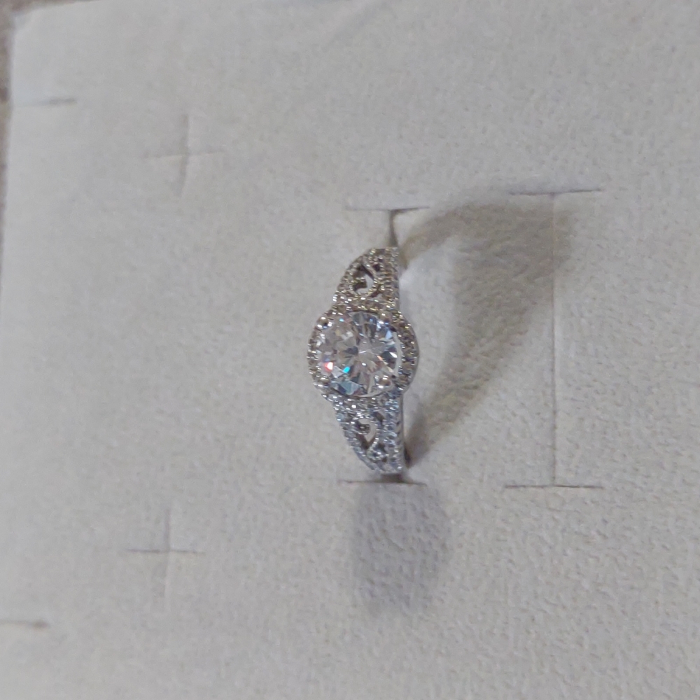 Sterling silver ring with artificial stones. Approx size 6. EUC